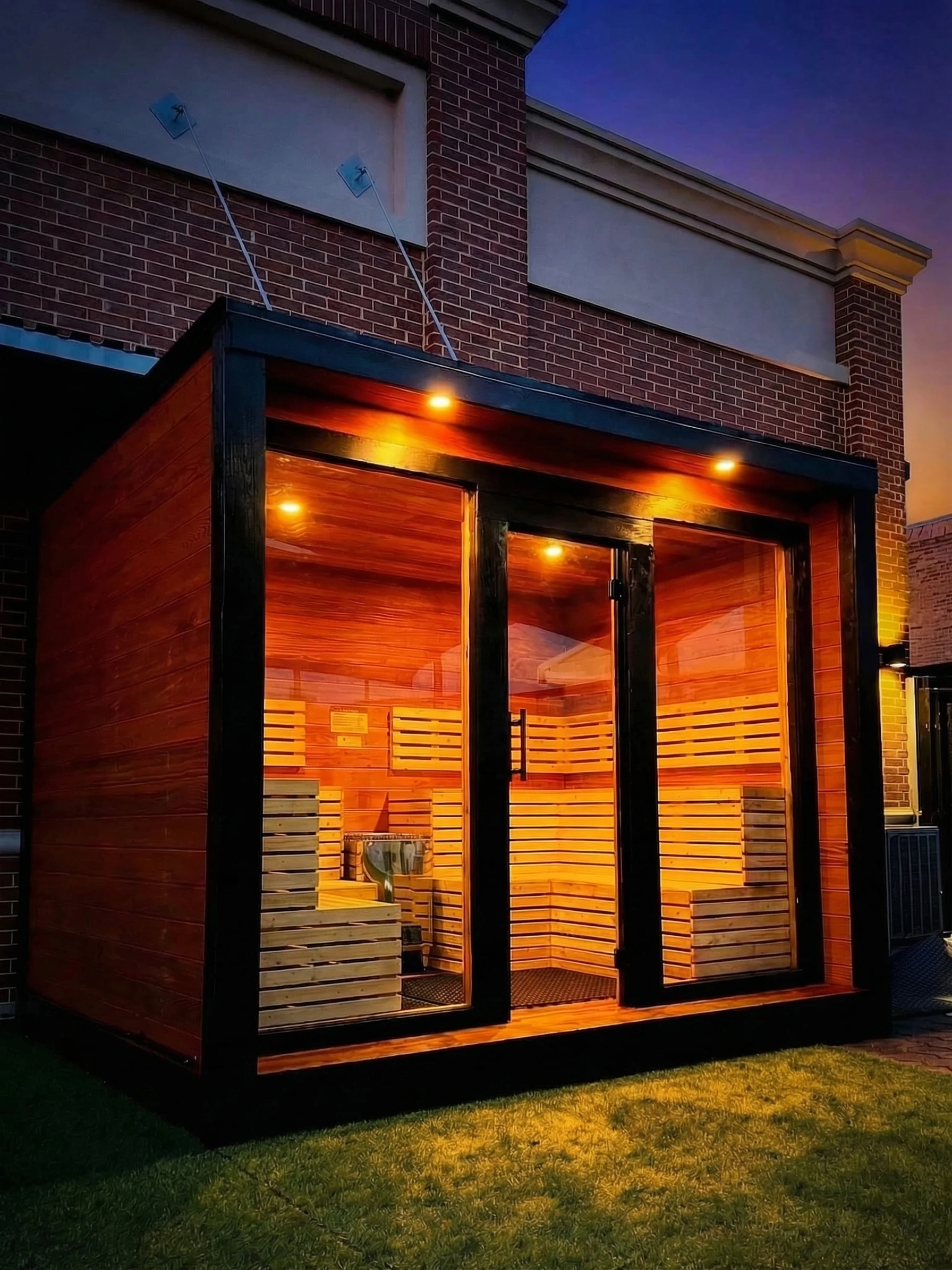 Commercial gym sauna illuminated at night
